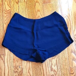 Forever 21 EUC women's black shorts with ruffle trim legs size M.